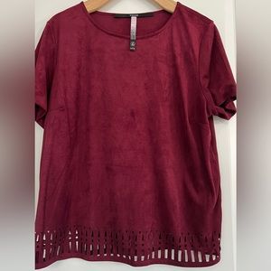 Kensie top with cut out .